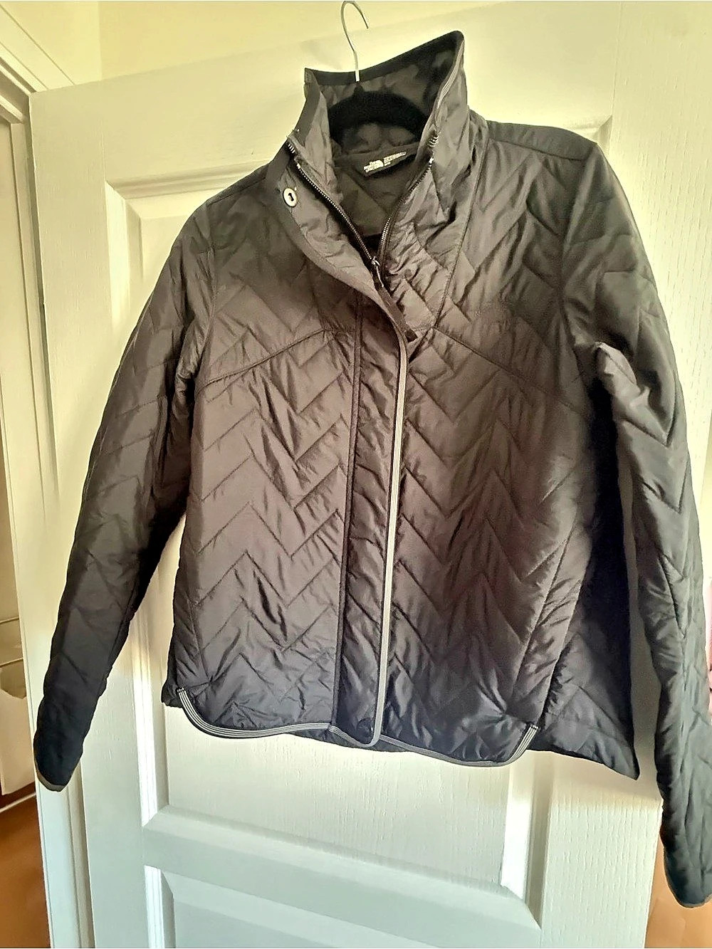 The North Face Quilted Puffer Jacket in Black